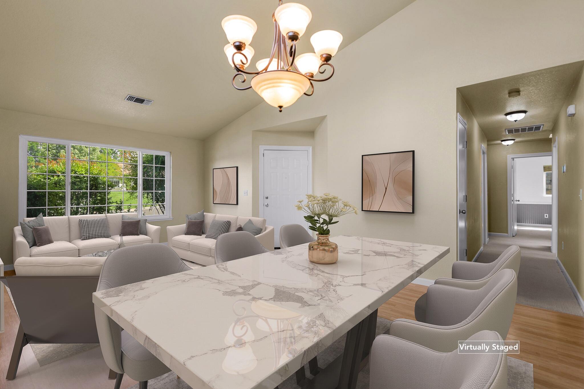 550 Vansicklen Way Redding, CA 96003 - Photo 7 of 52 a view of a dining room with furniture and chandelier