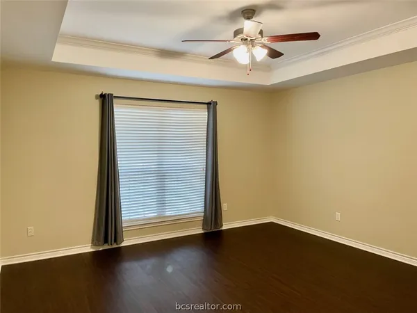 a bathroom with a sink toilet vanity and tub