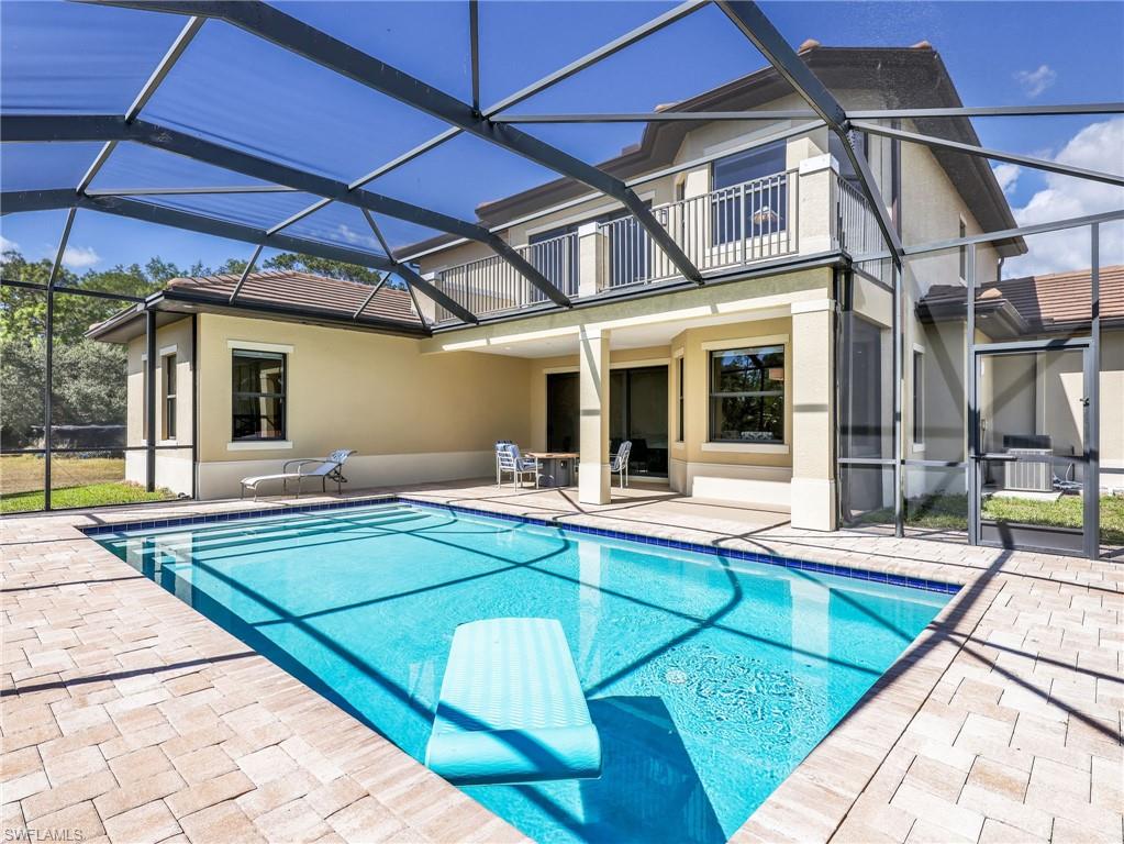 3160 27th Avenue Southwest Naples, FL 34117 - Photo 38 of 43 a view of a house with pool and sitting area