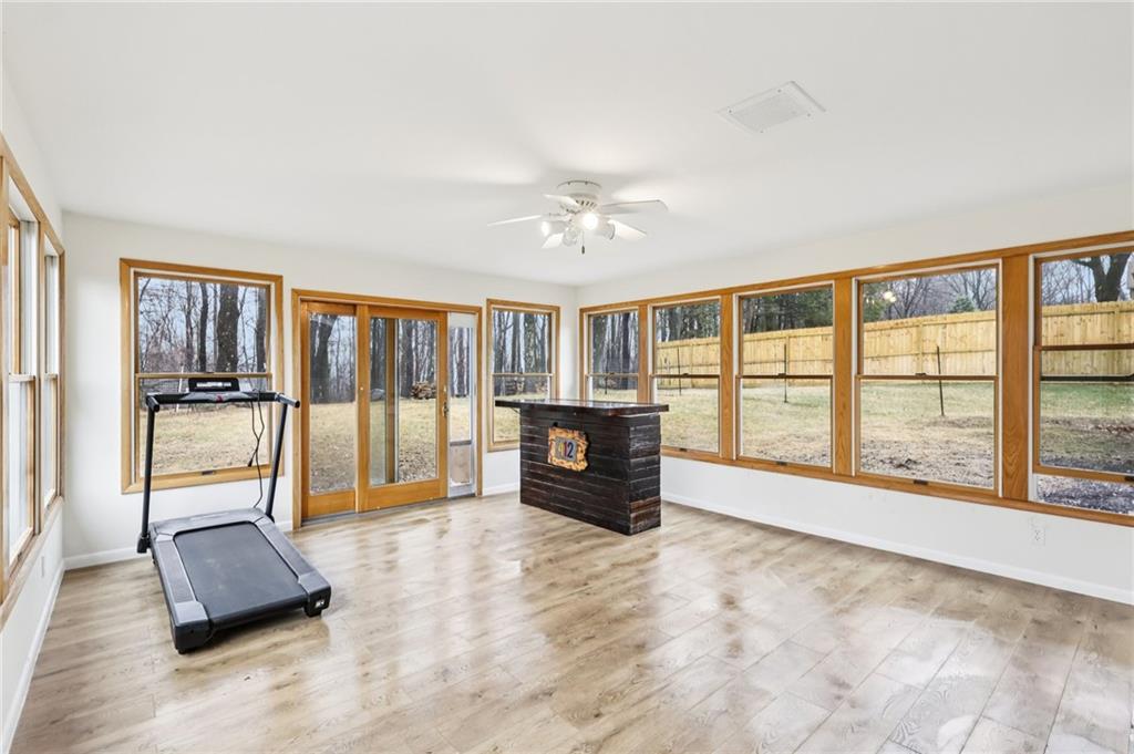 862 White Farm Road Indiana, PA 15701 - Photo 20 of 49 a living room with furniture and a large window with balcony view