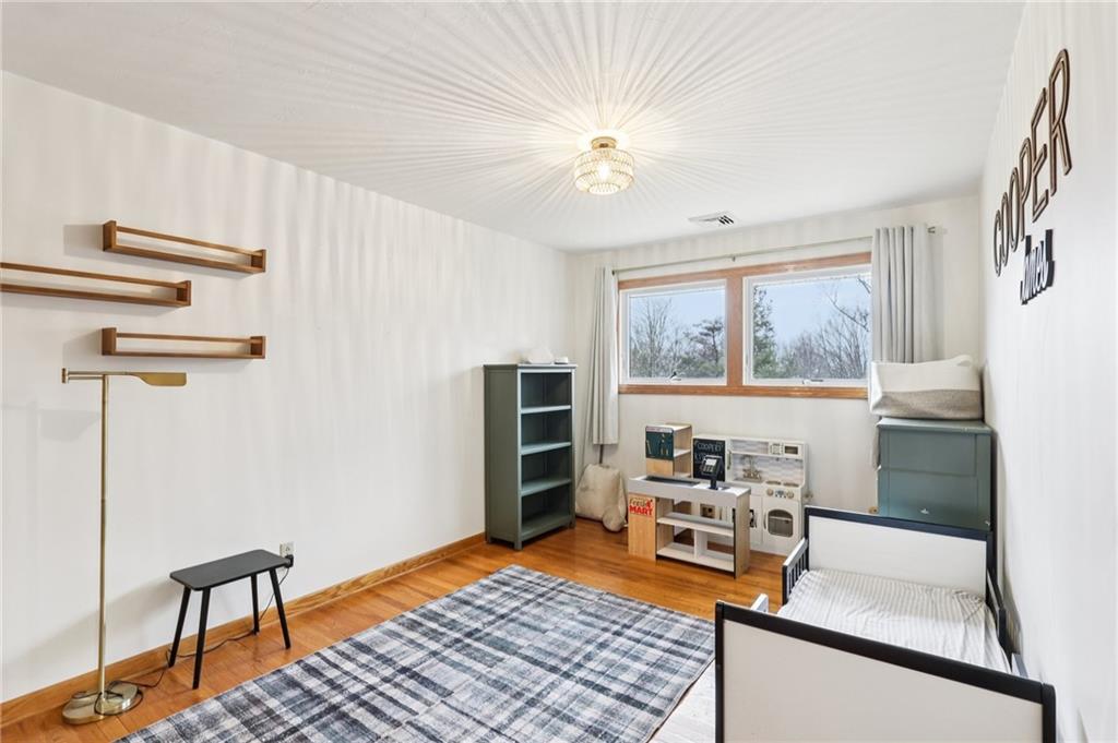 862 White Farm Road Indiana, PA 15701 - Photo 24 of 49 a room with furniture a rug and a window