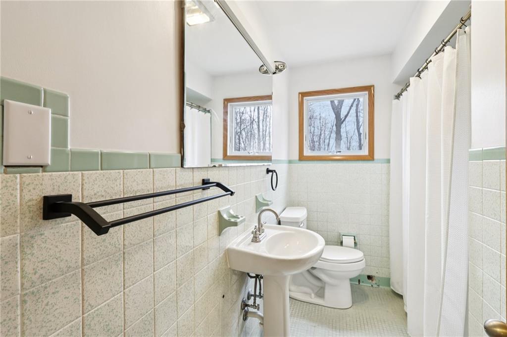 862 White Farm Road Indiana, PA 15701 - Photo 27 of 49 a bathroom with a sink a toilet and a mirror
