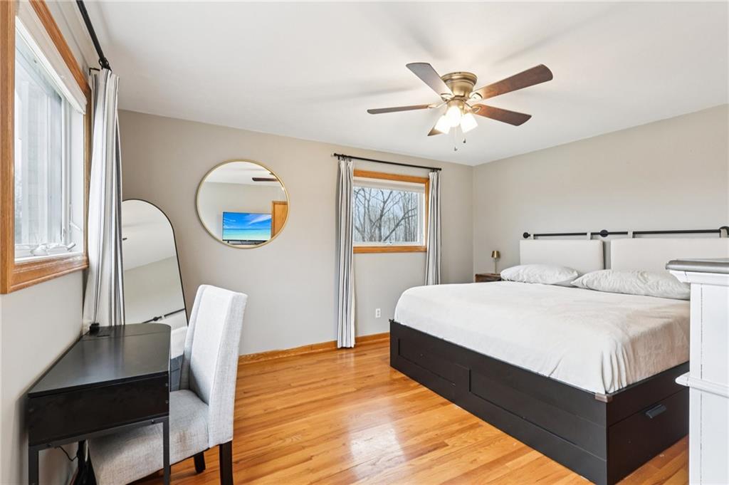 862 White Farm Road Indiana, PA 15701 - Photo 29 of 49 a bedroom with a bed and a chandelier