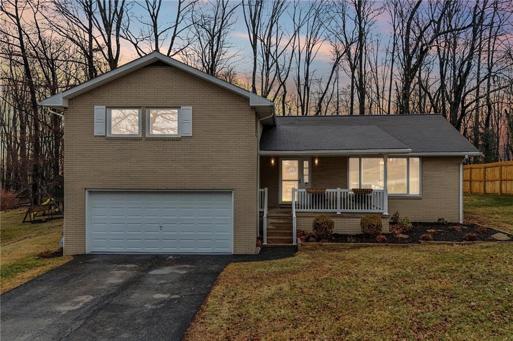 862 White Farm Road Indiana, PA 15701 - Photo 46 of 49 a front view of a house with garden