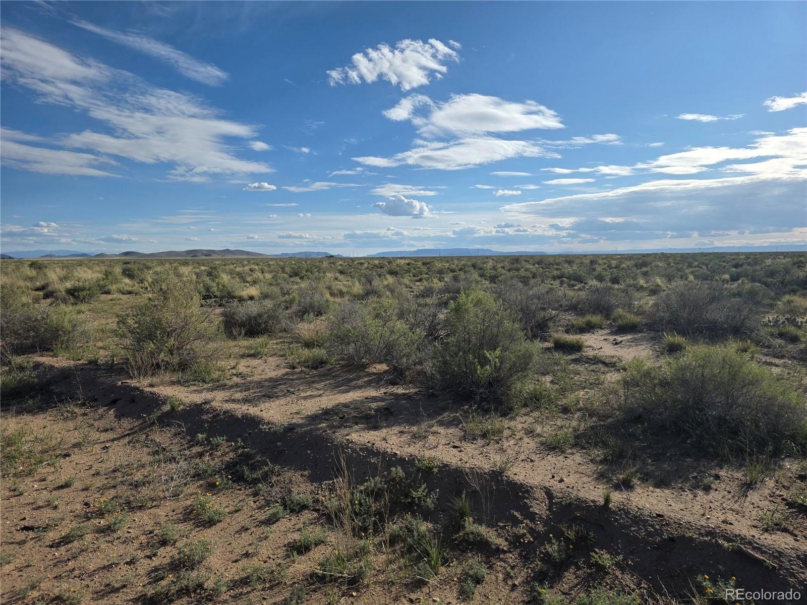 Lot 7 Gold Road Alamosa, CO 81101 - Photo 6 of 10 a view of a yard