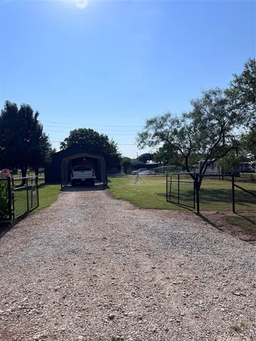 a house view with a garden space