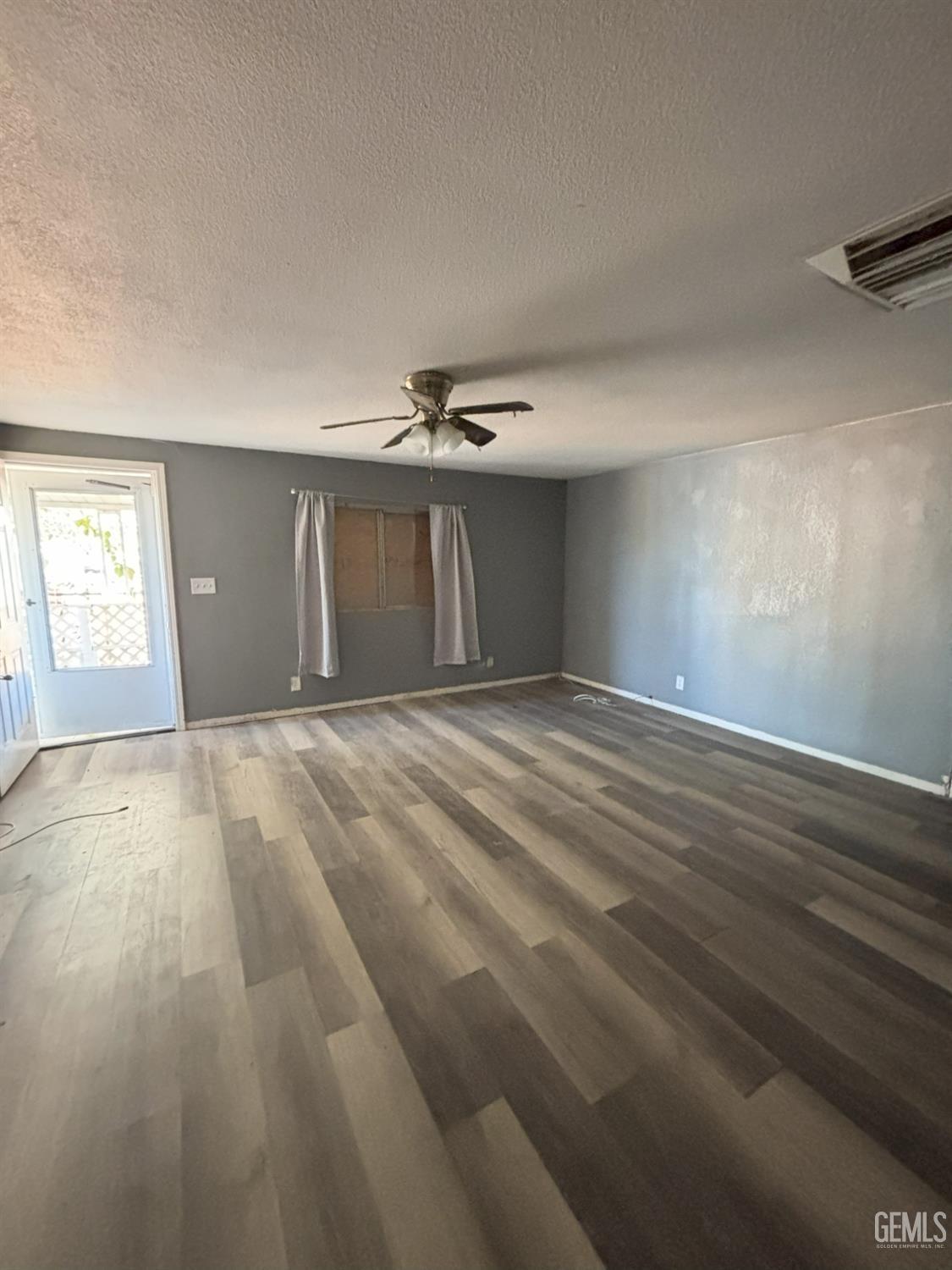 Undisclosed Address Ridgecrest, CA 93555 - Photo 11 of 27 a view of an empty room and window
