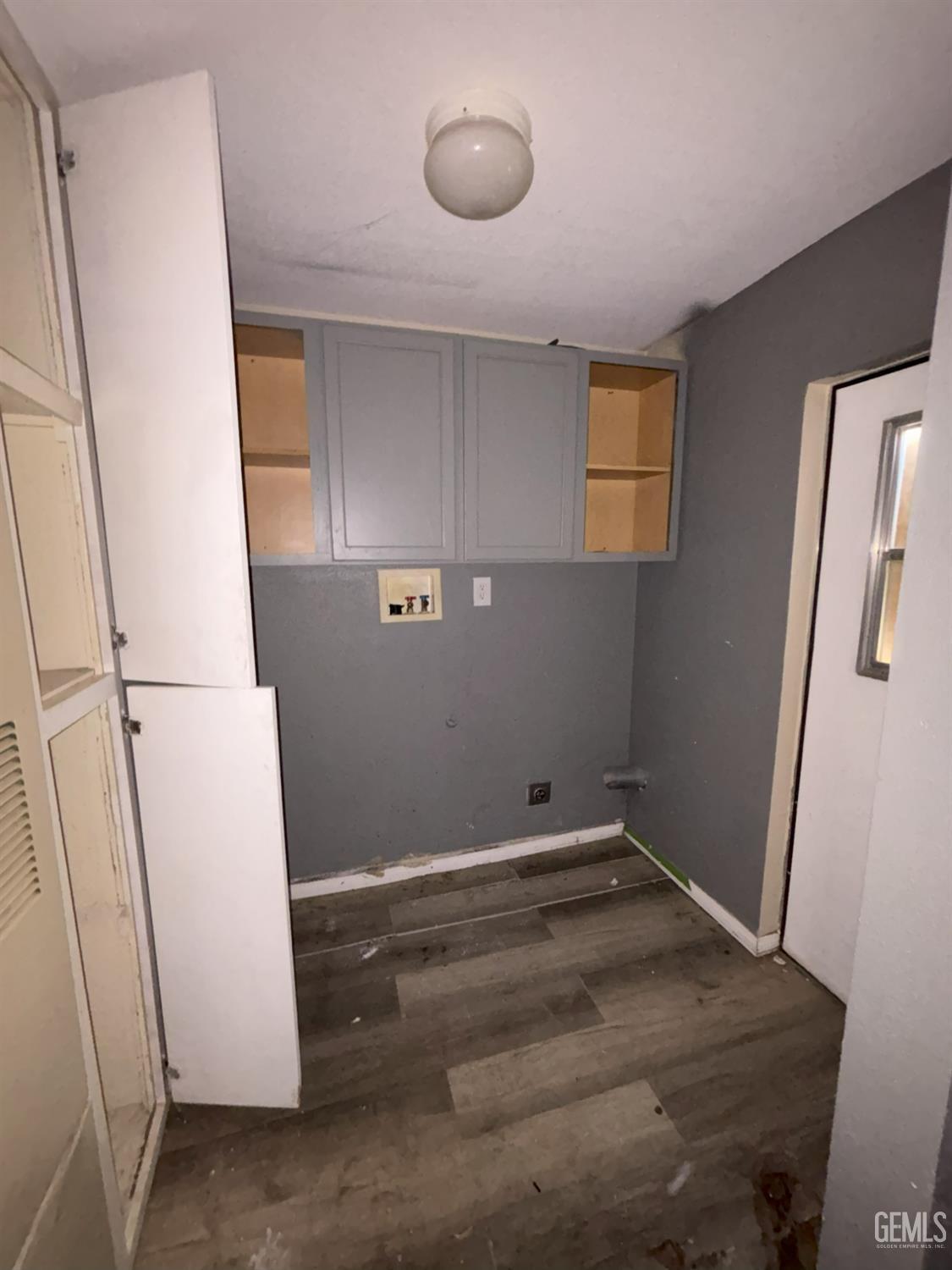 Undisclosed Address Ridgecrest, CA 93555 - Photo 15 of 27 a view of storage and utility room with wooden floor