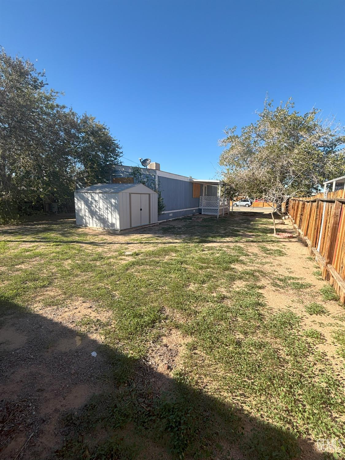 Undisclosed Address Ridgecrest, CA 93555 - Photo 26 of 27 a view of a large swimming pool with an ocean view