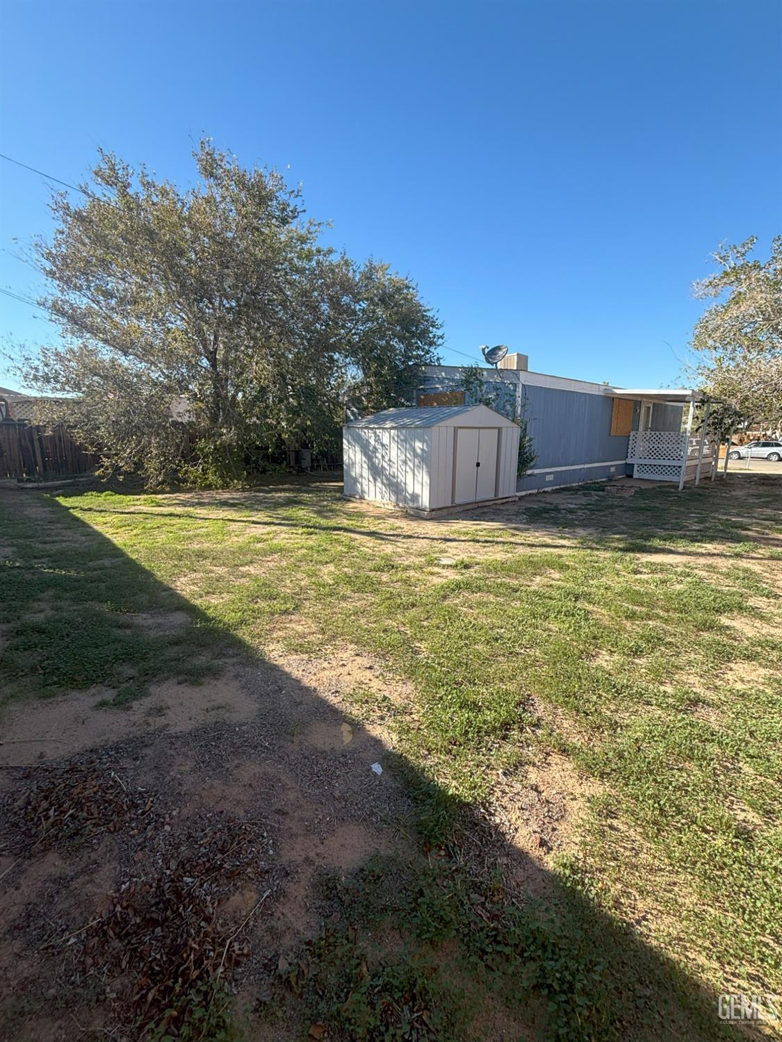 Undisclosed Address Ridgecrest, CA 93555 - Photo 27 of 27 a swimming pool with an outdoor space and seating area