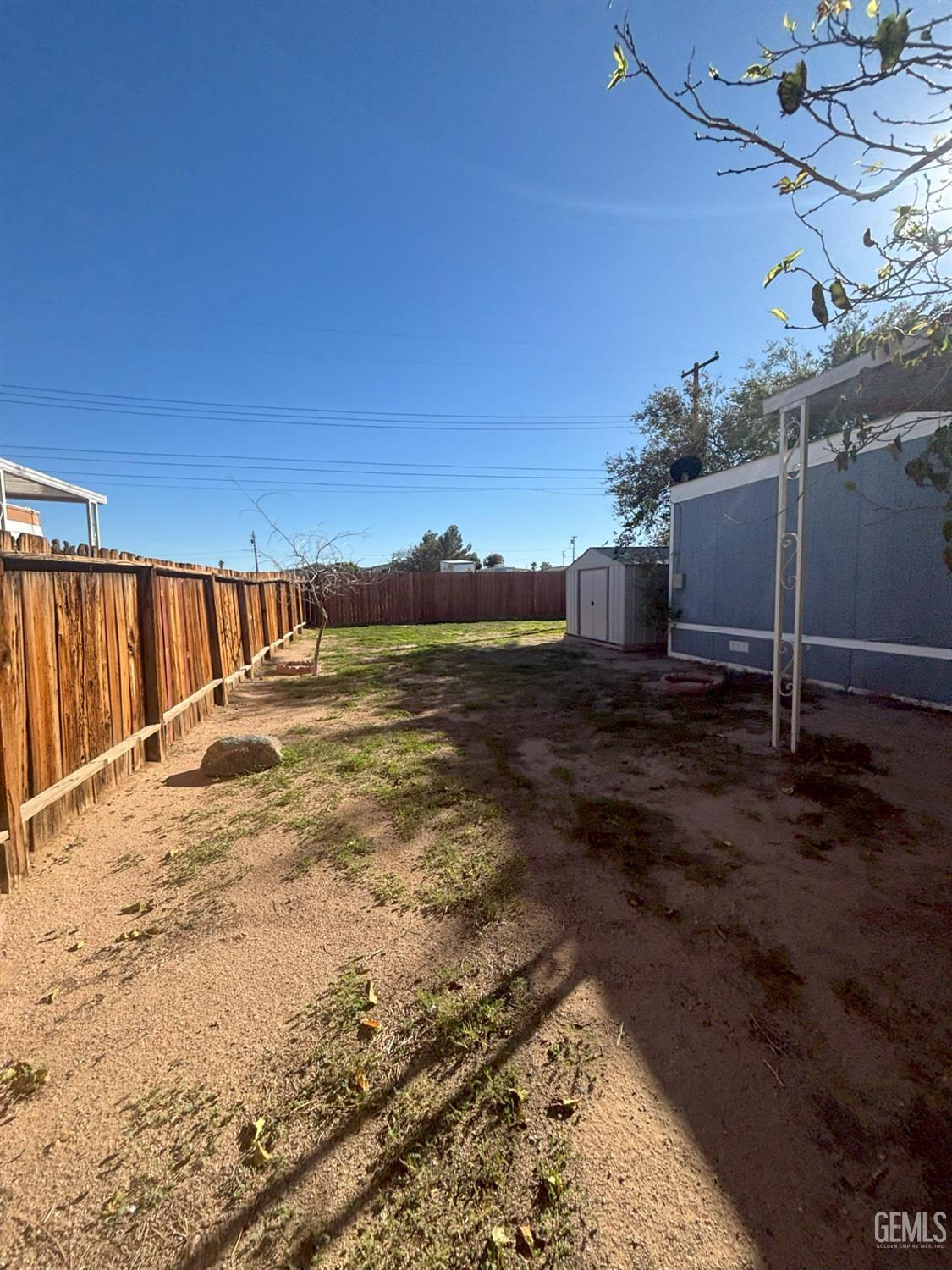 Undisclosed Address Ridgecrest, CA 93555 - Photo 5 of 27 a view of a backyard of the house