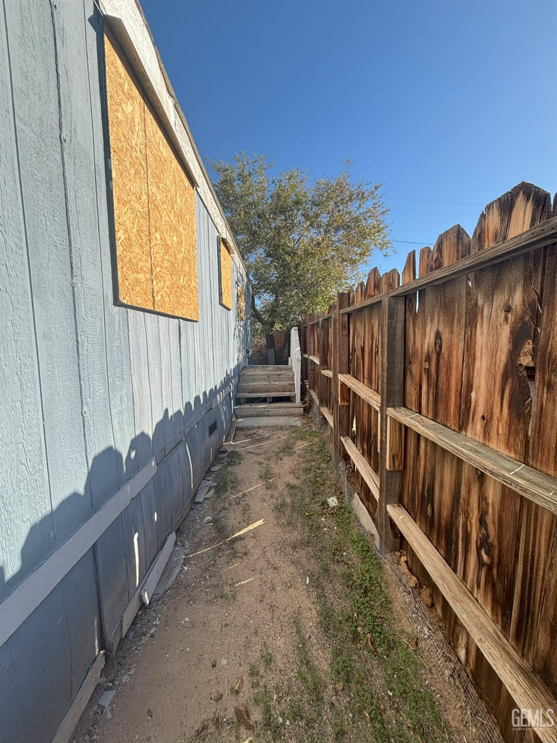 Undisclosed Address Ridgecrest, CA 93555 - Photo 7 of 27 a view of balcony with wooden floor and fence