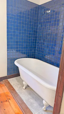 a bathroom with a bathtub