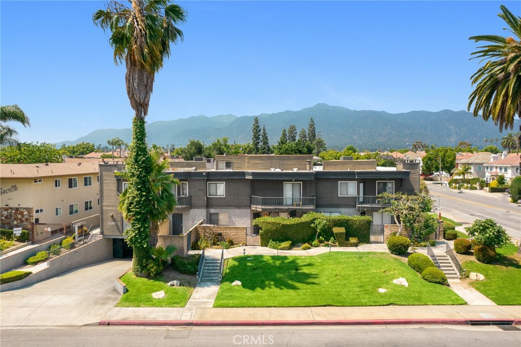 1107 West Duarte Road, Unit D Arcadia, CA 91007 - Photo 1 of 1 a view of a house with a yard and potted plants