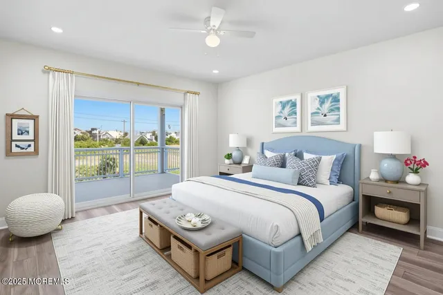 a spacious bedroom with a bed and a large window