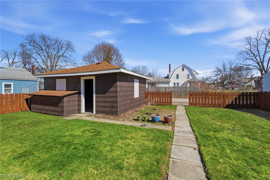 4422 State Road Ashtabula, OH 44004 - Photo 5 of 21 Fenced backyard with an outdoor structure