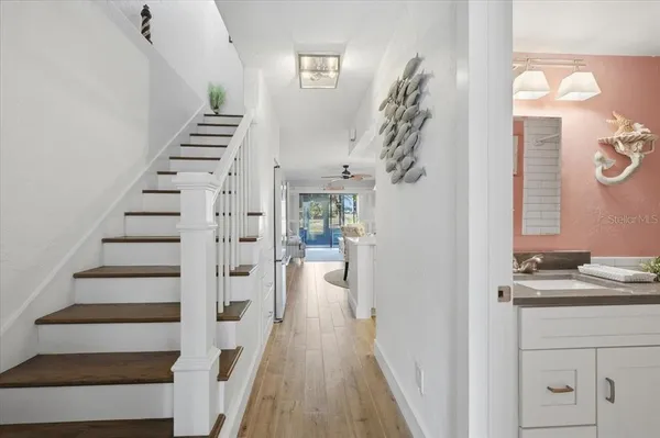 a bedroom with a bed and a table