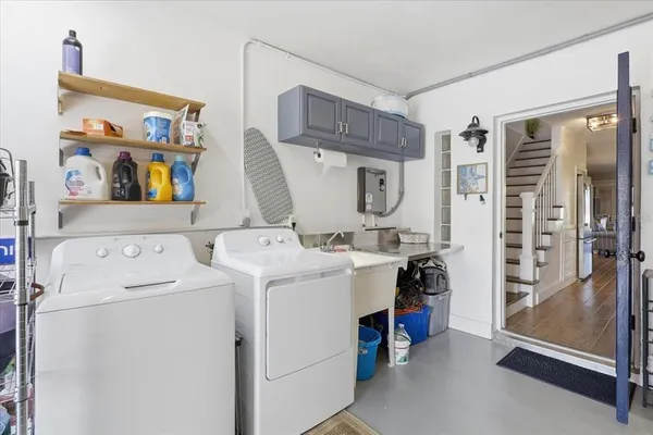 an aerial view of swimming pool patio and mountain view