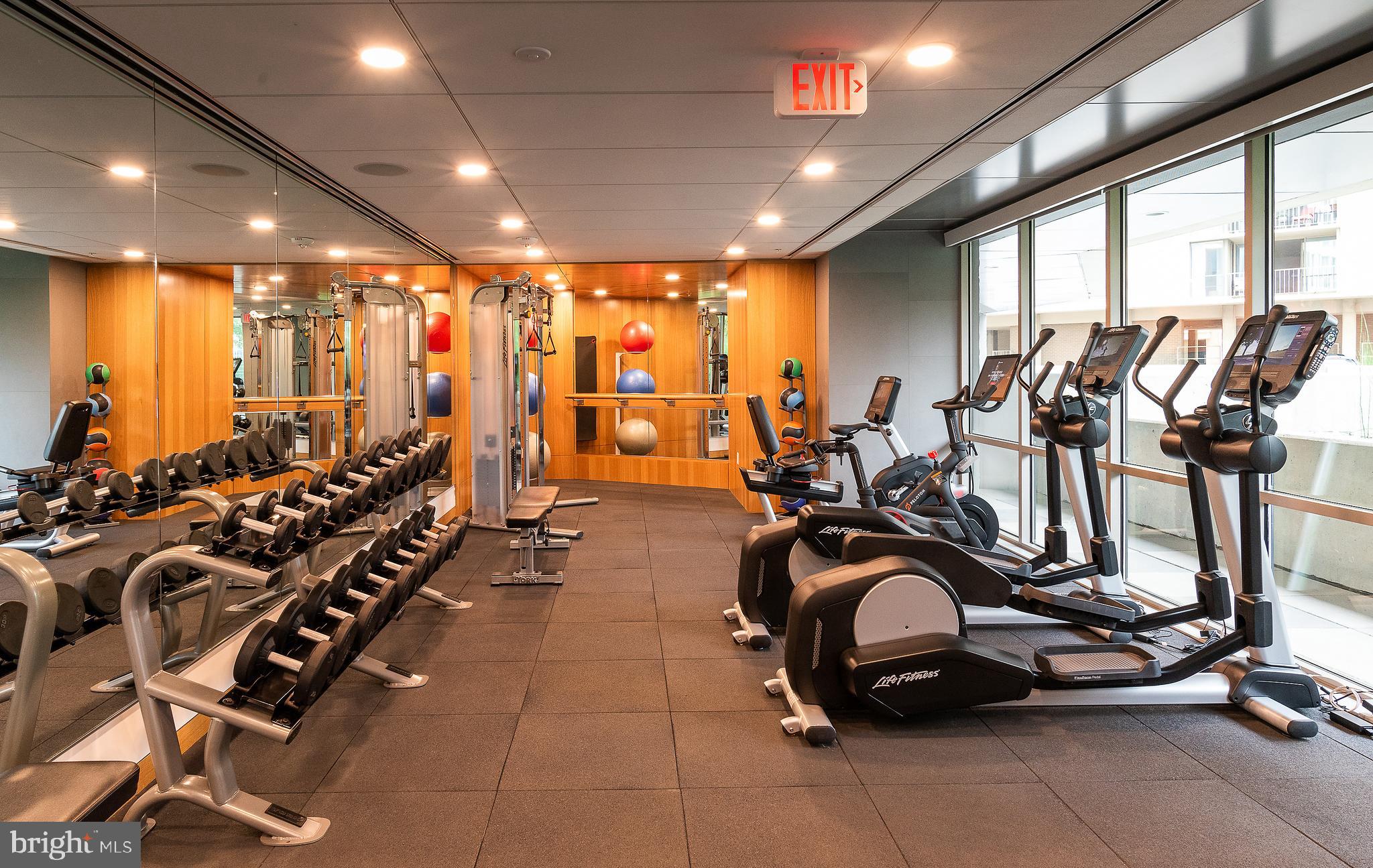 900 7th Street Southwest, Unit PH04 Washington, DC 20024 - Photo 22 of 25 a view of a room with gym equipment