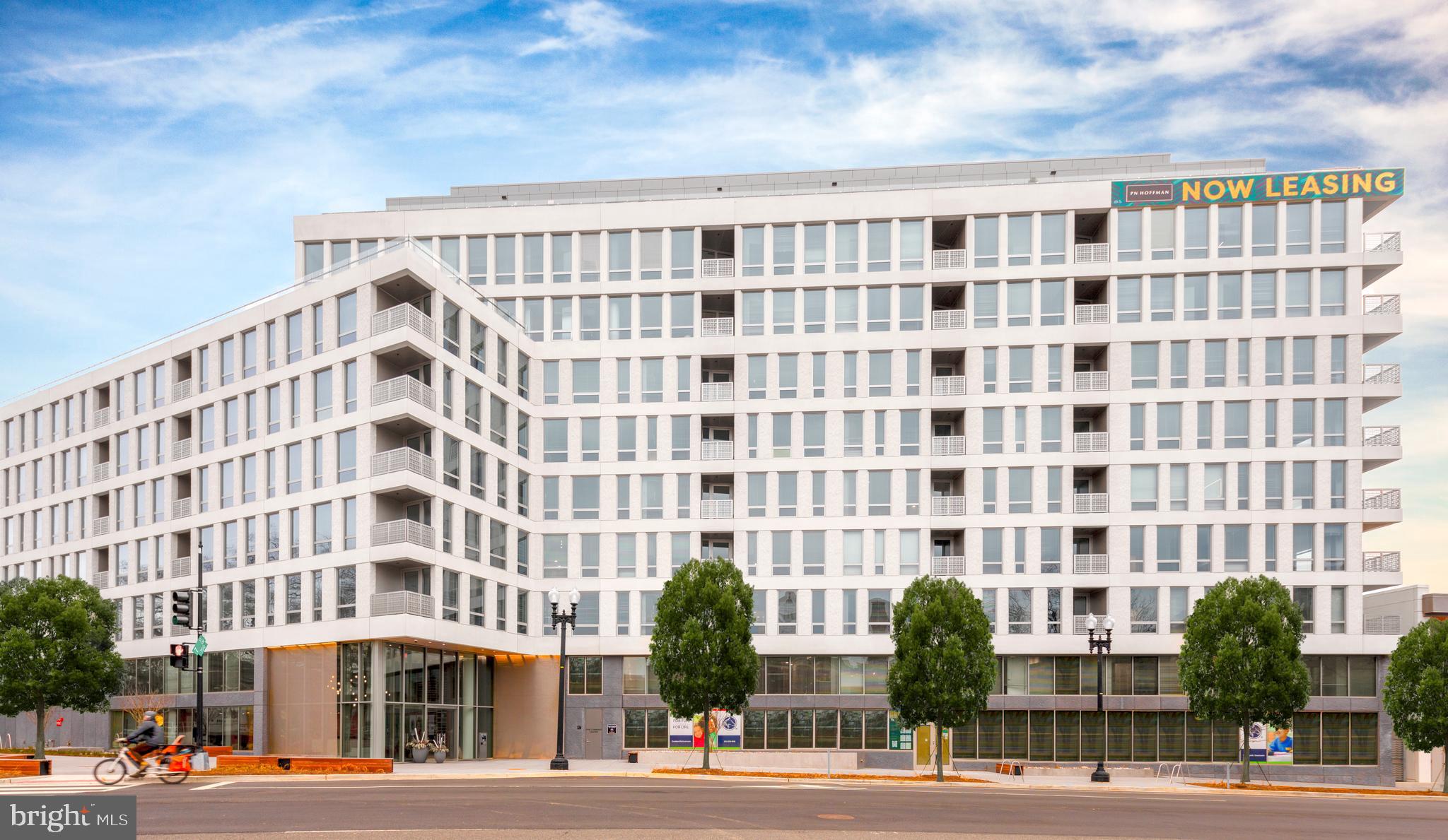 900 7th Street Southwest, Unit PH04 Washington, DC 20024 - Photo 6 of 25 a front view of a building with street view