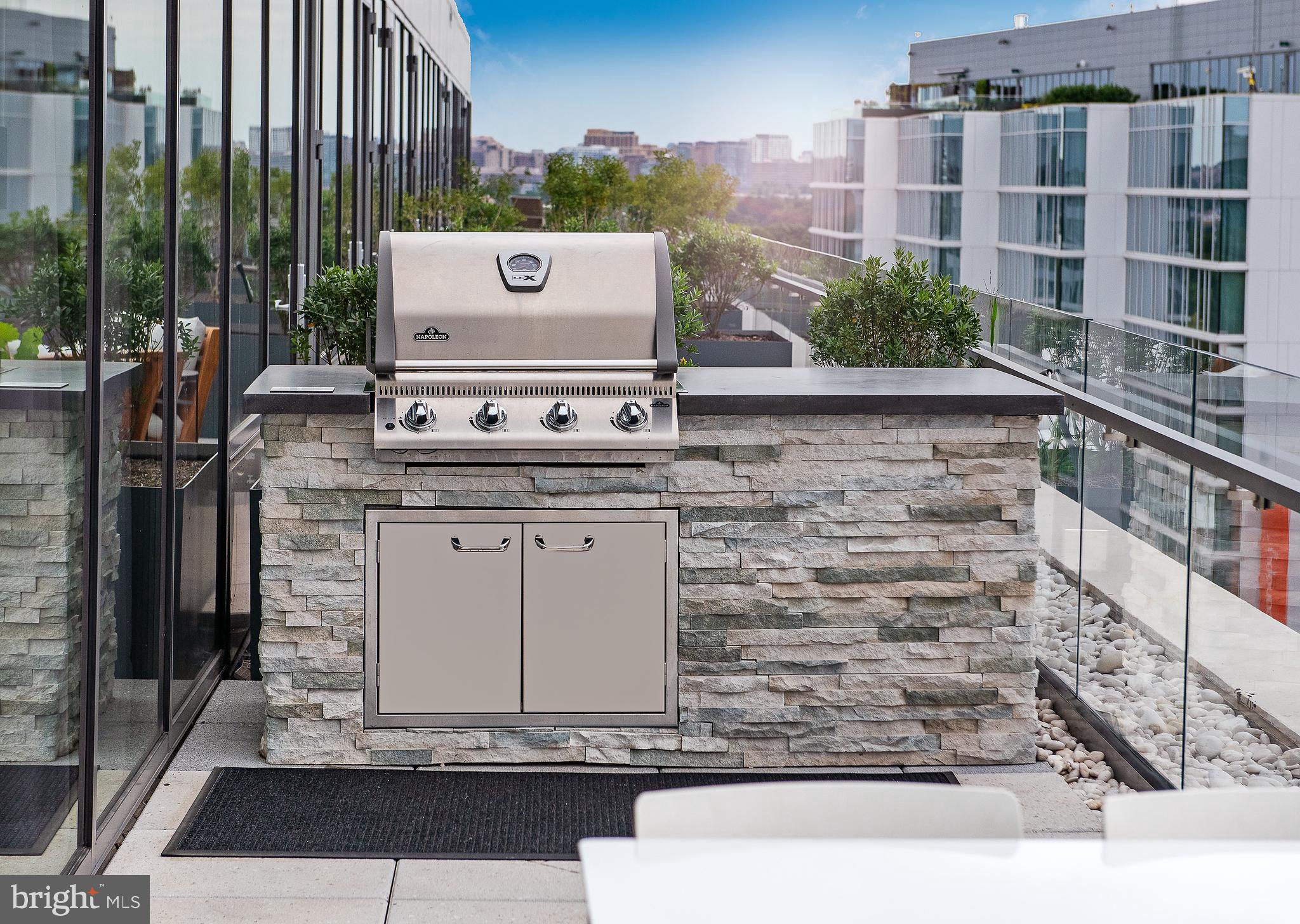 900 7th Street Southwest, Unit PH04 Washington, DC 20024 - Photo 10 of 25 a buildings with trees in front of it