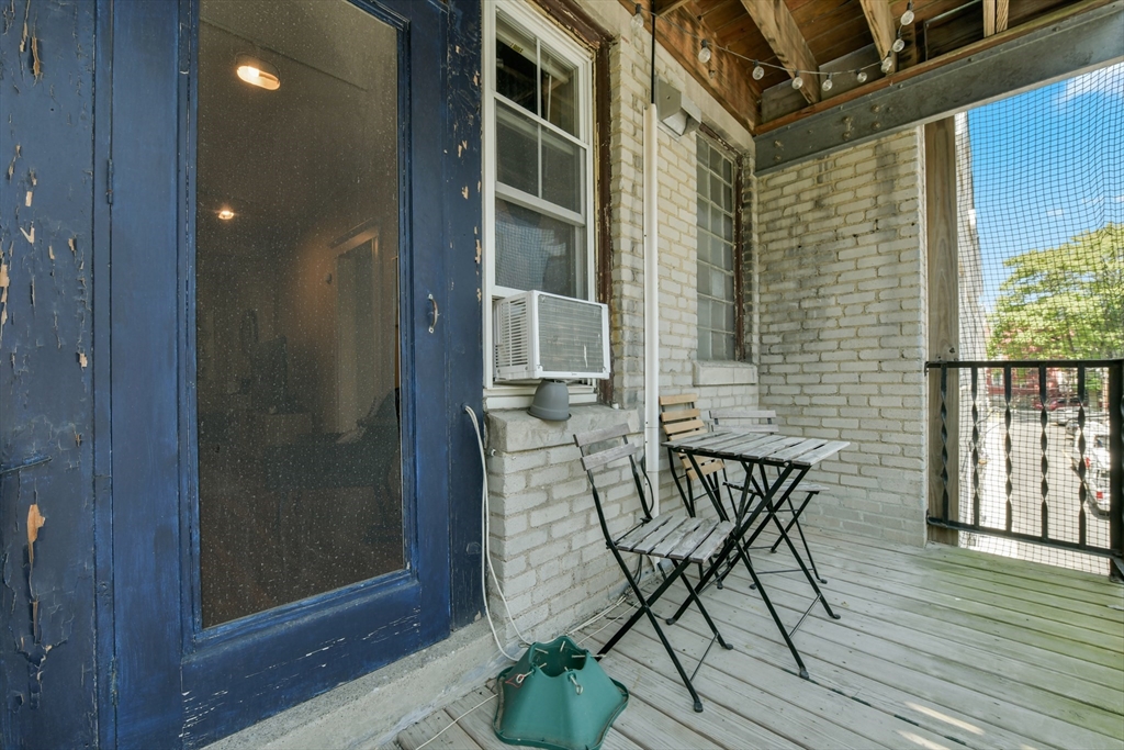 301 Allston Street, Unit 7 Boston, MA 02135 - Photo 20 of 25 a view of balcony and chairs