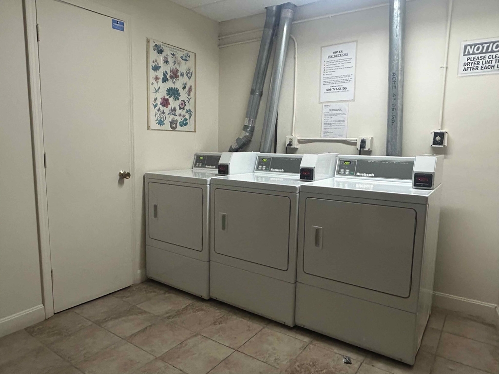 301 Allston Street, Unit 7 Boston, MA 02135 - Photo 23 of 25 a view of bathroom with dual sinks