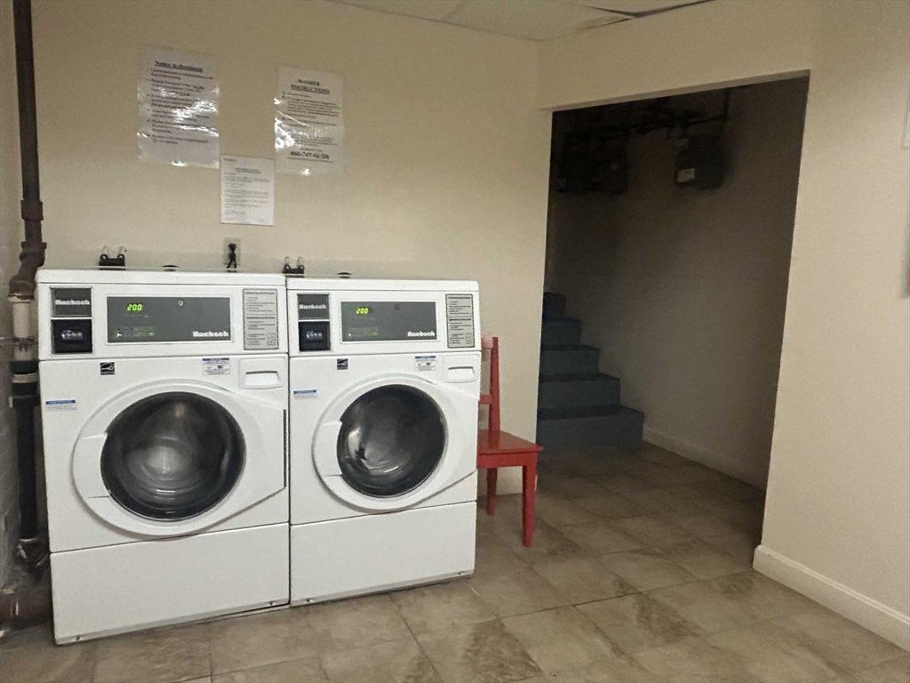 301 Allston Street, Unit 7 Boston, MA 02135 - Photo 24 of 25 a utility room with dryer and washer
