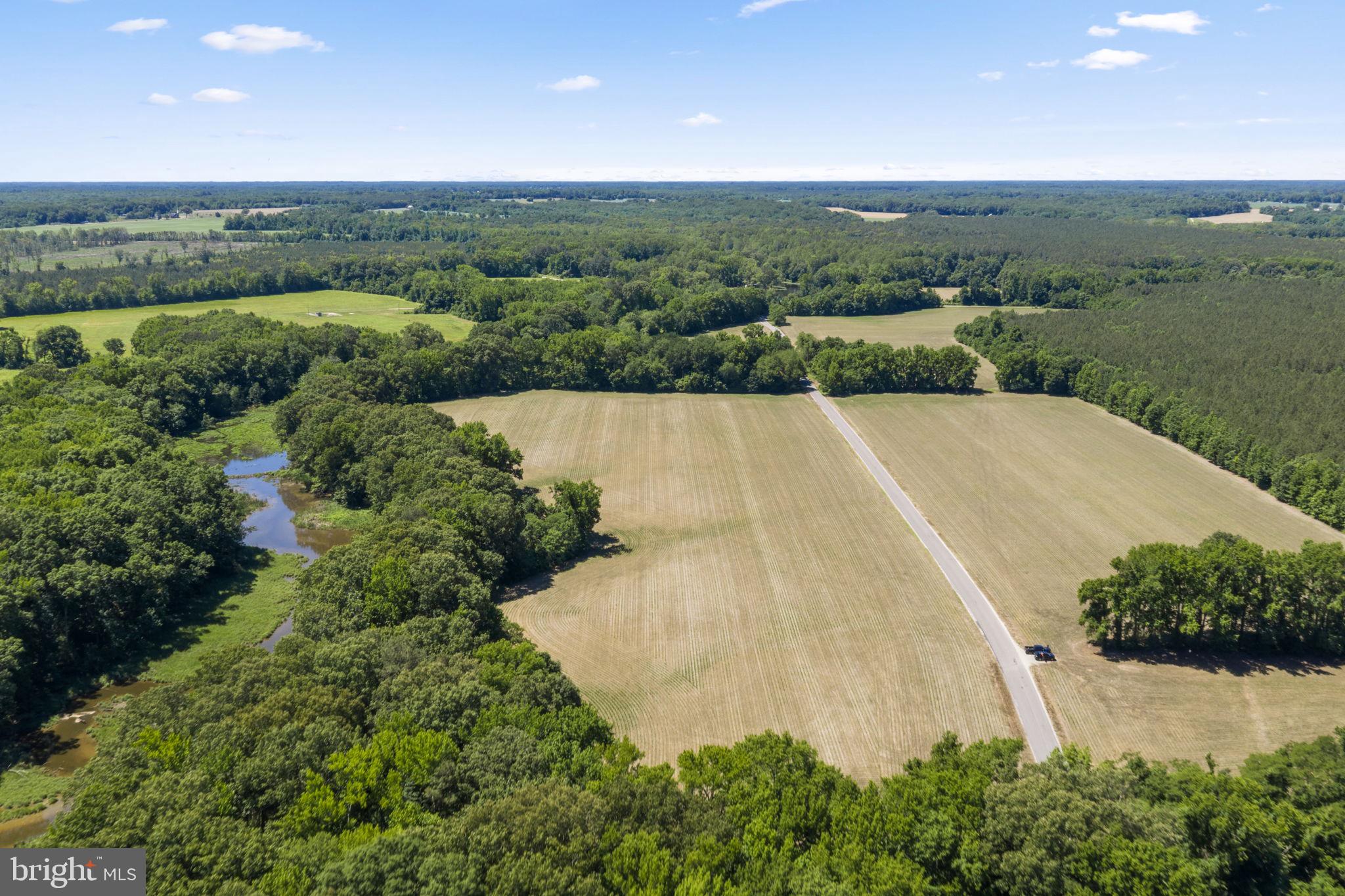 2 Wilton Road Hague, VA 22469 - Photo 3 of 12 an aerial view of a house with a yard