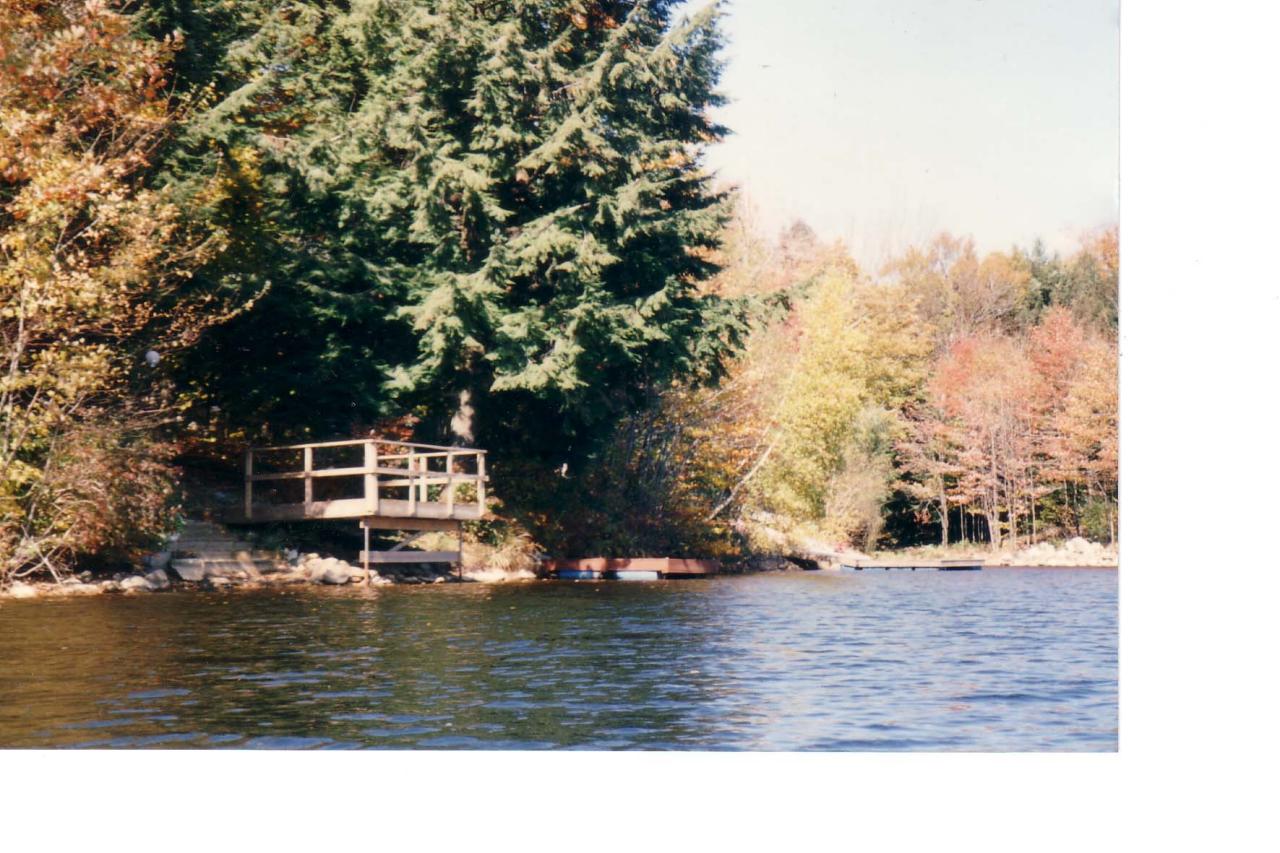 82 Porcupine Point Road Tolland, MA 01034 - Photo 5 of 18 dock on property edge