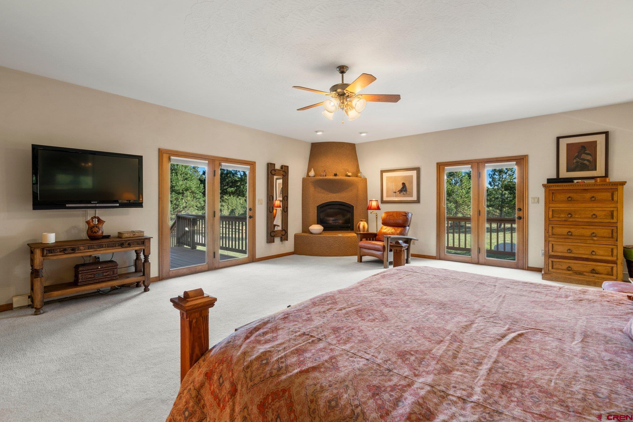 747 Oak Drive Durango, CO 81301 - Photo 12 of 34 a living room with furniture and a flat screen tv