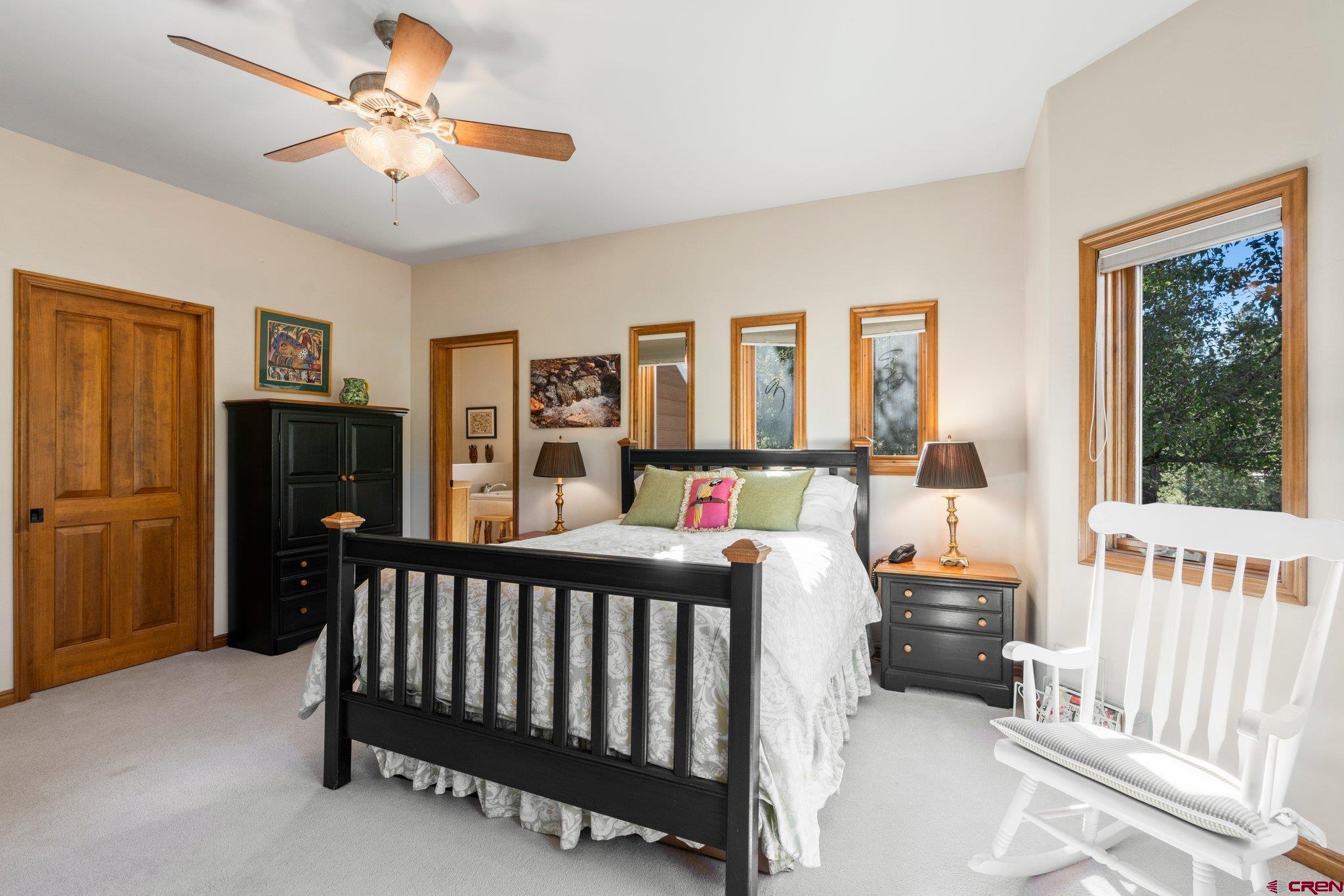 747 Oak Drive Durango, CO 81301 - Photo 15 of 34 a bedroom with furniture and a window