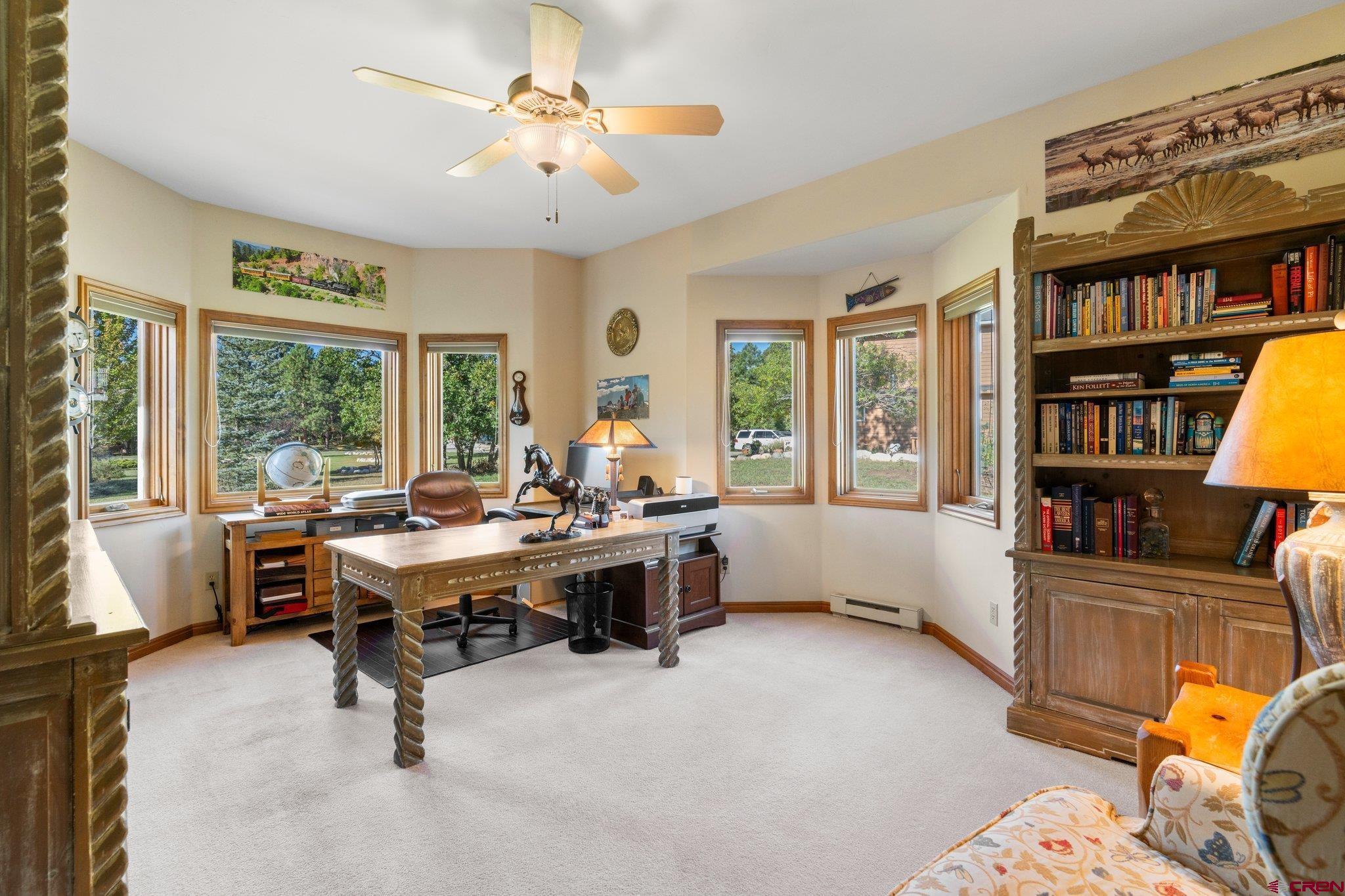 747 Oak Drive Durango, CO 81301 - Photo 19 of 34 a view of a workspace with furniture and a window