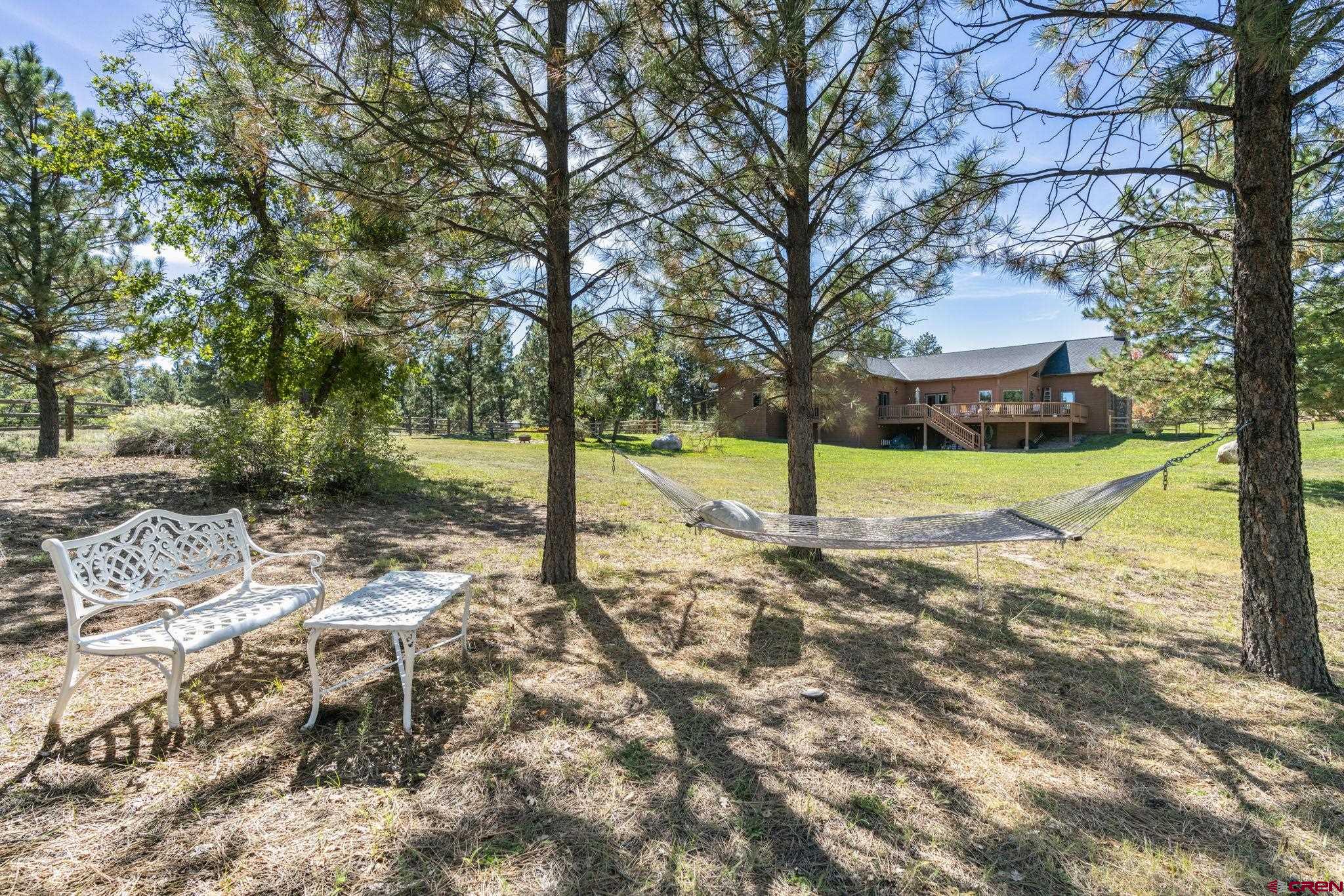 747 Oak Drive Durango, CO 81301 - Photo 31 of 34 a view of a house with a backyard