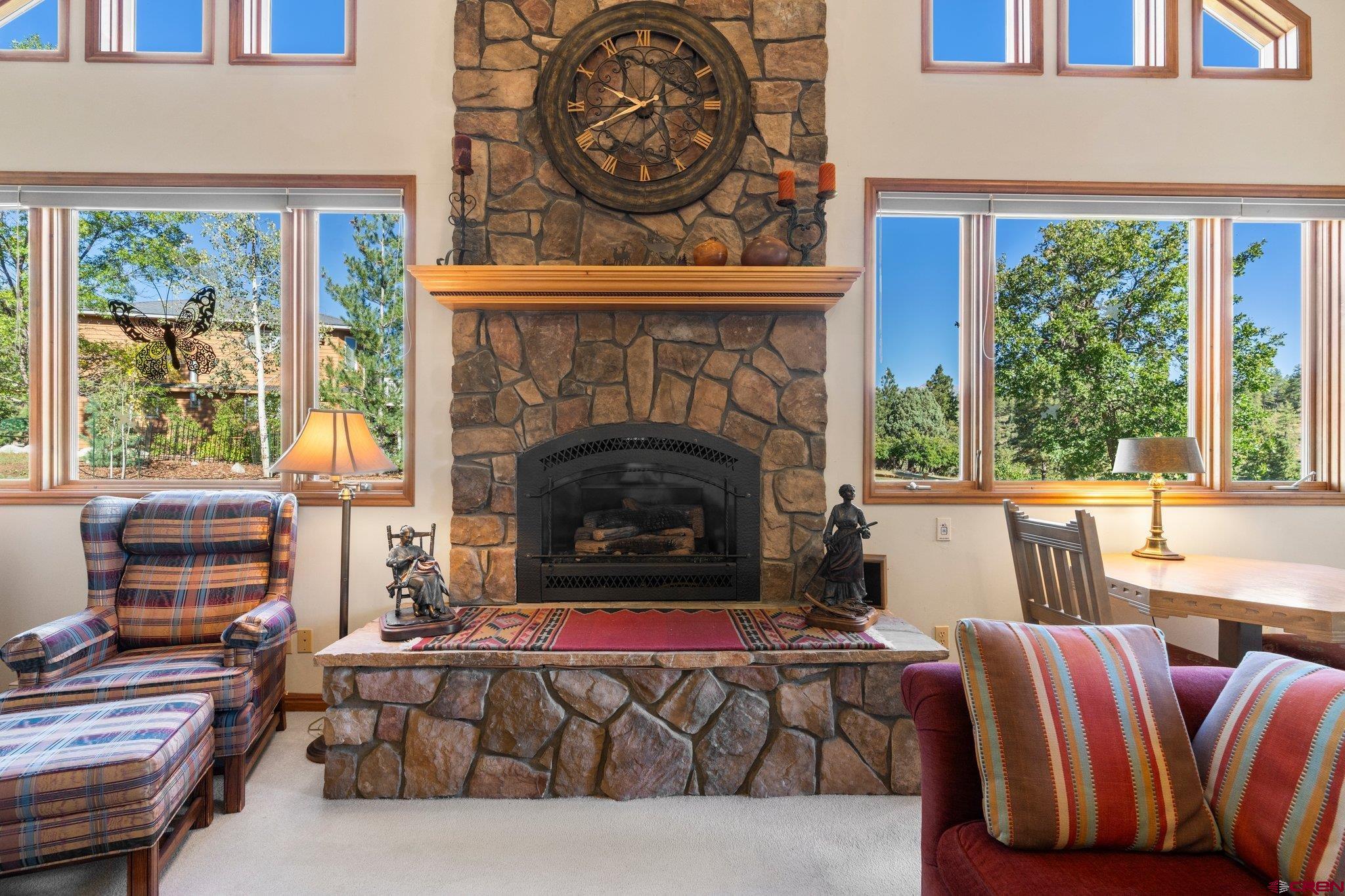 747 Oak Drive Durango, CO 81301 - Photo 4 of 34 a living room with furniture fireplace and window