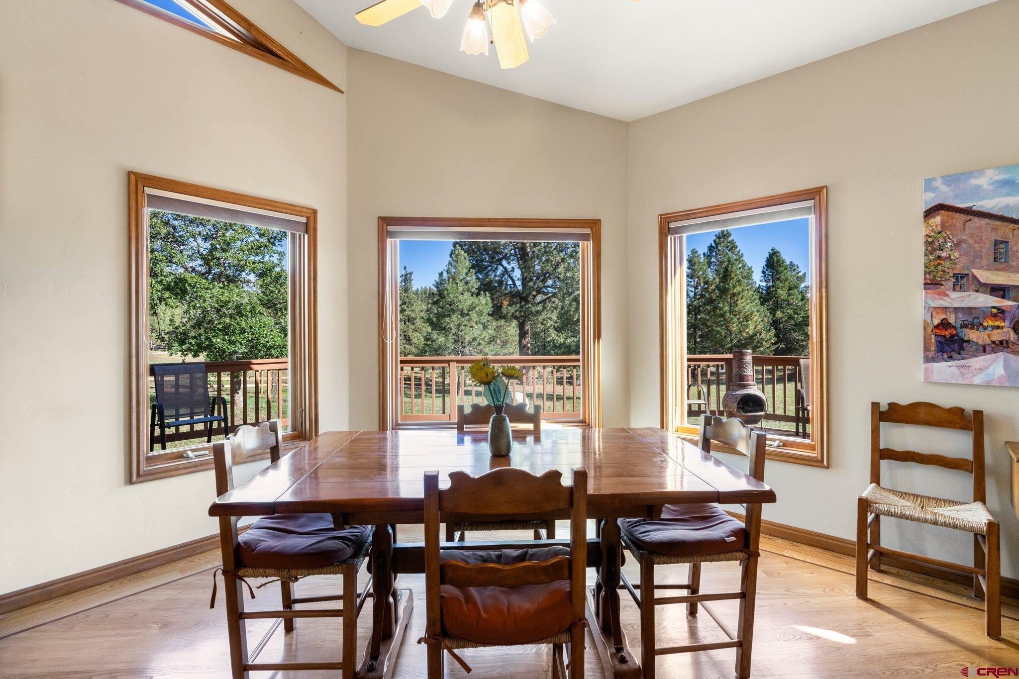 747 Oak Drive Durango, CO 81301 - Photo 9 of 34 a view of a dining room with furniture window and outside view