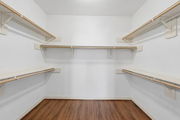 a view of an empty walk in closet