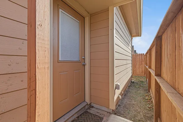 a view of a balcony with stairs