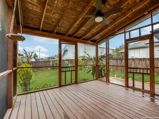 a view of porch with wooden floor