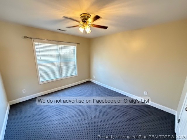 8836 Looking Glass Road Linden, NC 28356 - Photo 15 of 22 a view of an empty room with wooden floor and a window