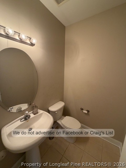 8836 Looking Glass Road Linden, NC 28356 - Photo 4 of 22 a bathroom with a sink a toilet and mirror