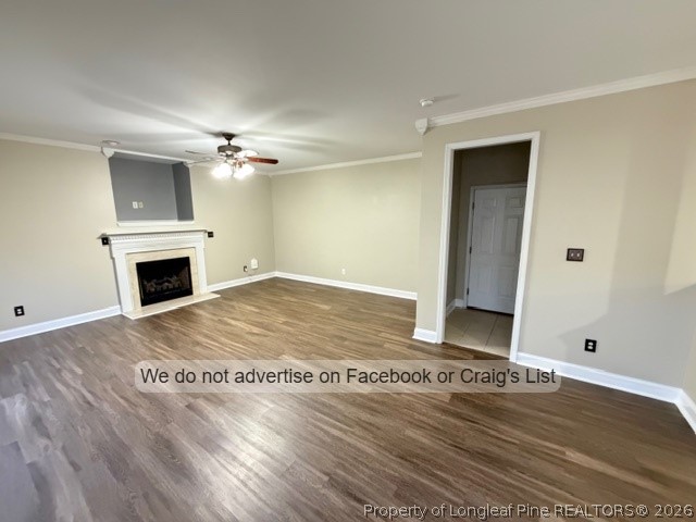 8836 Looking Glass Road Linden, NC 28356 - Photo 7 of 22 a view of an empty room with wooden floor fireplace and a window
