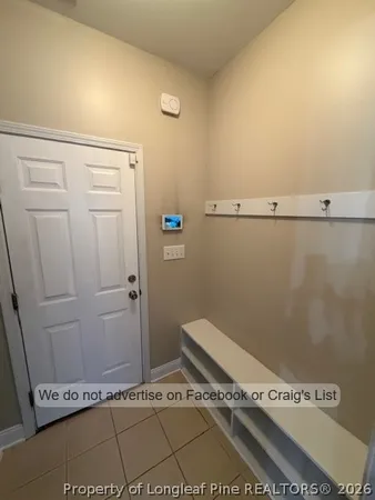 a view of a hallway with windows
