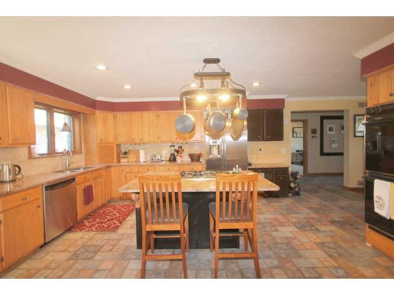 458 School Road Clinton, PA 15026 - Photo 11 of 25 Kitchen. Spacious, 24x17, Kitchen has solid granite counter tops with ceramic tile floors and stainless steel appliances.
