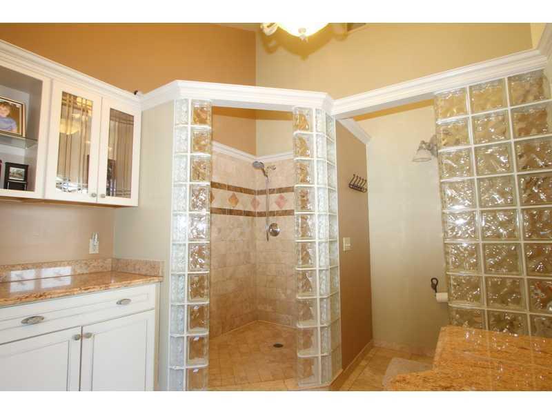 458 School Road Clinton, PA 15026 - Photo 17 of 25 Master Bath/Spa. A fabulous Master Bath looks and feels ike a spa with ceramic tile walk-in shower, granite counter tops, white cabinetry. This Bath exits to a private Patio at the back of the home.