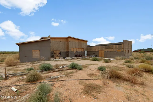 a view of a living room and bathroom