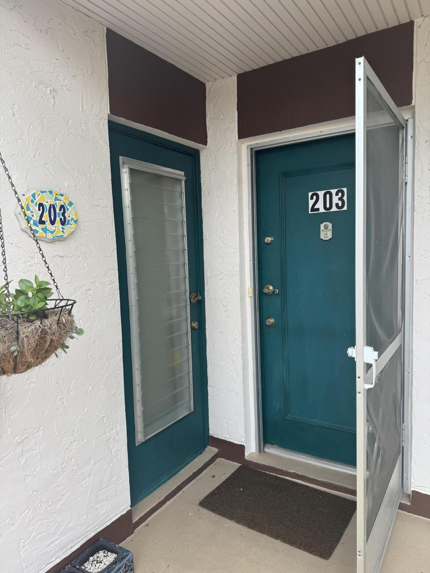 4 Greenway Village North, Unit 203 Royal Palm Beach, FL 33411 - Photo 1 of 19