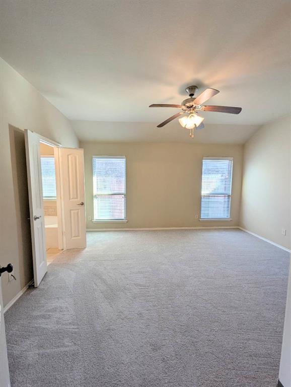 2110 Spruce Street Anna, TX 75409 - Photo 4 of 13 a view of an empty room with a window