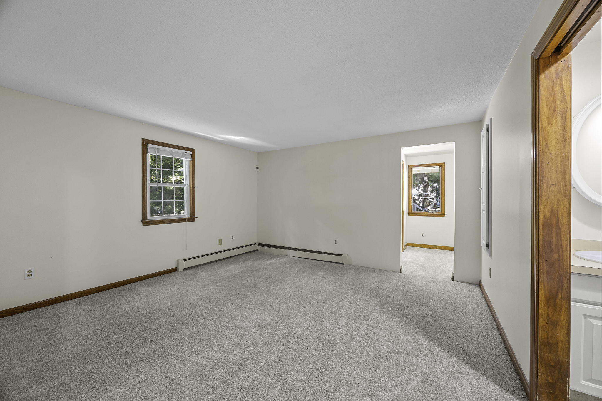 5 Carl Gardner Road Monument Beach, MA 02532 - Photo 15 of 29 an empty room with windows