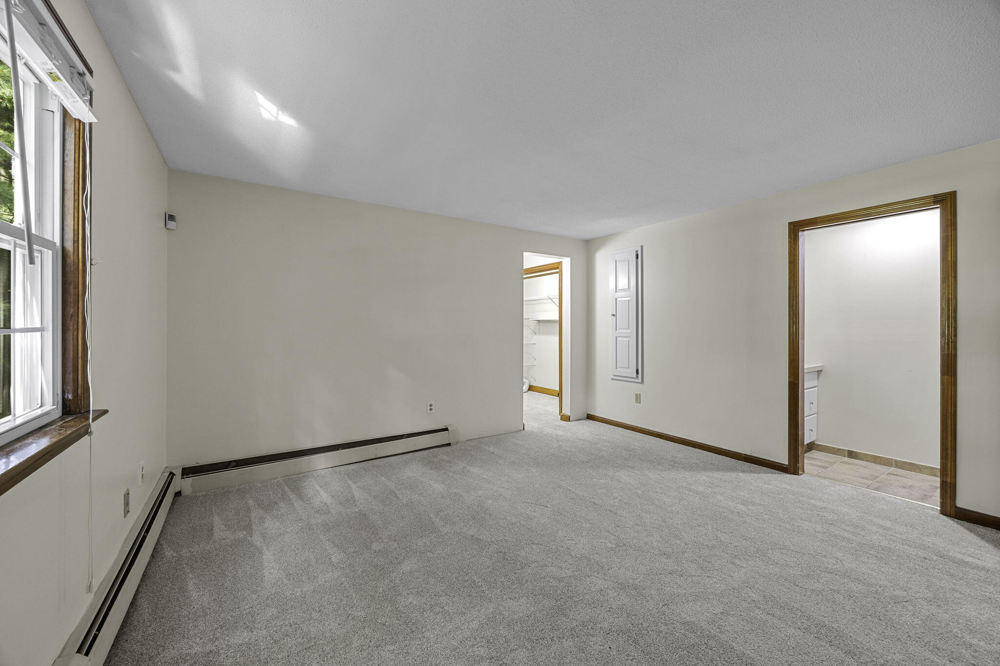 5 Carl Gardner Road Monument Beach, MA 02532 - Photo 16 of 29 an empty room with windows and closet